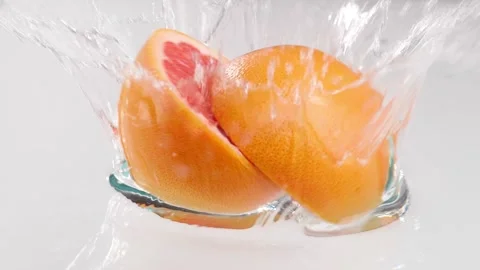 Slice Grapefruit in Water splash Video stock 134212420