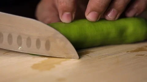 Slice green pepper. Dinner preparations in fancy restaurant Stock Footage 119000821