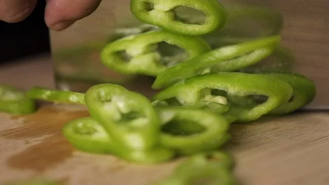 Slice green pepper. Dinner preparations in fancy restaurant Stock Footage 119000887