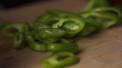 Slice green pepper. Dinner preparations in fancy restaurant Stock Footage 119000948