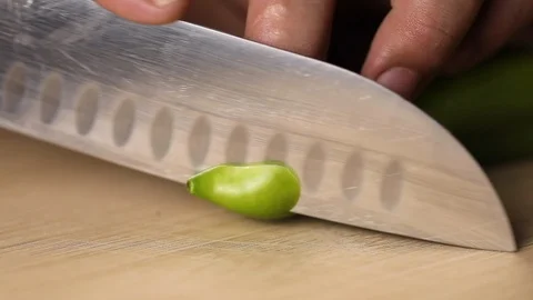 Slice green pepper. Dinner preparations in fancy restaurant Stock Footage 119001047