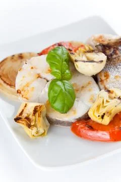 Slice of hake grilled Stock Photos