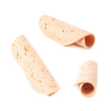 Slice of ham over isolated white background Foto stock