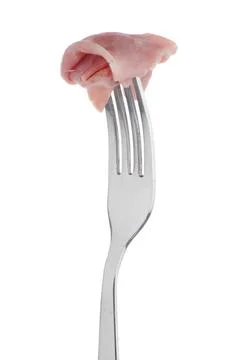 Slice of ham skewered on a fork Slice of ham skewered on a fork isolated o... Stock Photos