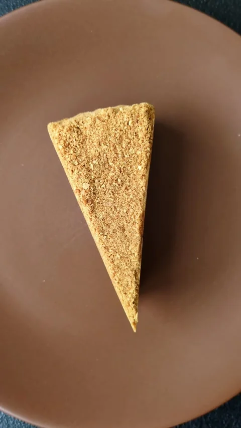 A slice of honey puff cake or pumpkin, carrot and cream pie, vegan sweets Stock Footage 308965284