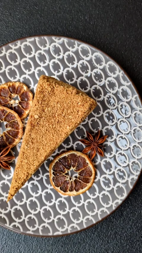 A slice of honey puff cake or pumpkin, carrot and cream pie, vegan sweets Stock Footage 308965305
