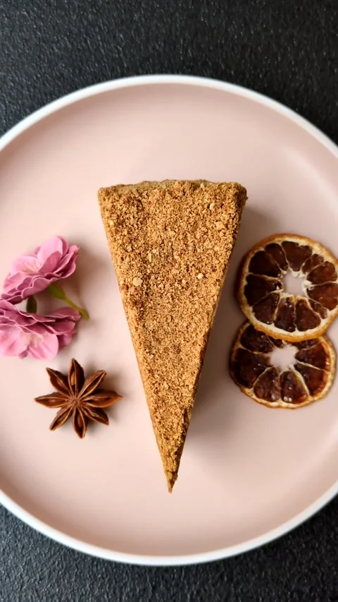 A slice of honey puff cake or pumpkin, carrot and cream pie, vegan sweets Stock Footage 308965314