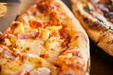 Slice of hot pizza large cheese lunch or dinner crust Stock Photos