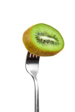 Slice of kiwi on a fork Stock Photos