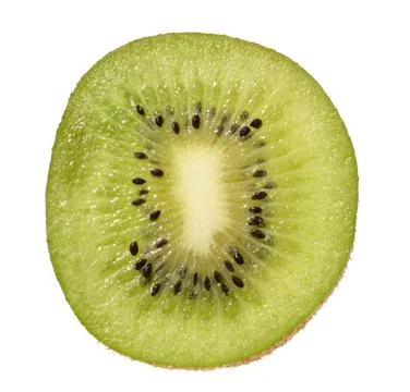 Slice kiwi fruit, isolated background. The vibrant green flesh with black see Foto stock