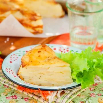 A Slice of Layered Potato Bake Stock-Fotos
