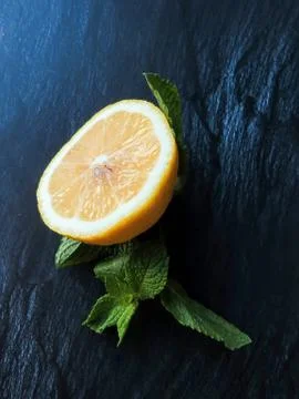Slice of lemon and sprig of mint Stock Photos
