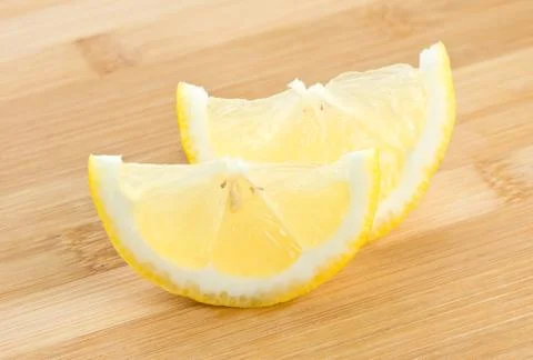 Slice of lemon background Stock Photos