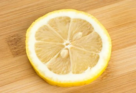 Slice of lemon background Stock Photos