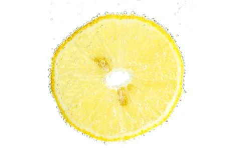 Slice of lemon with bubbles Stock Photos