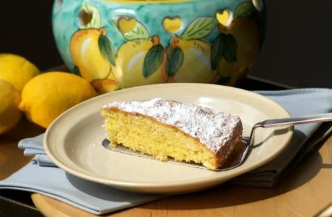 Slice of lemon cake Stock Photos