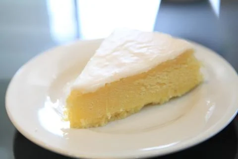 Slice of lemon cheese cake Stock Photos