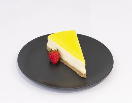 A slice of lemon cheesecake Stock Photos