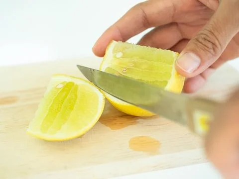 Slice Lemon Fruit, Shef Cutting Lime Cooking in Kitchen Restaurant Stock Photos