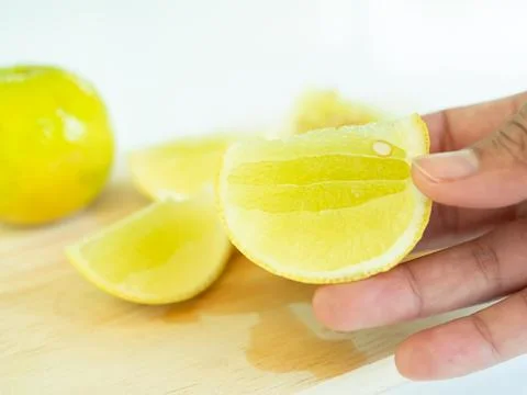 Slice Lemon Fruit, Shef Cutting Lime Cooking in Kitchen Restaurant Stock Photos