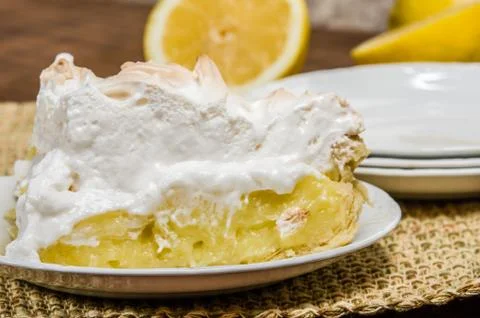 Slice of lemon meringue pie Stock Photos