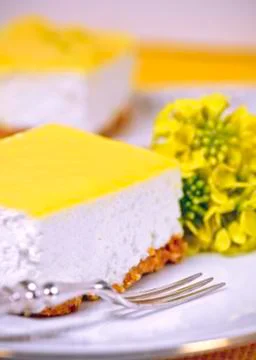 Slice of lemon mousse Stock Photos
