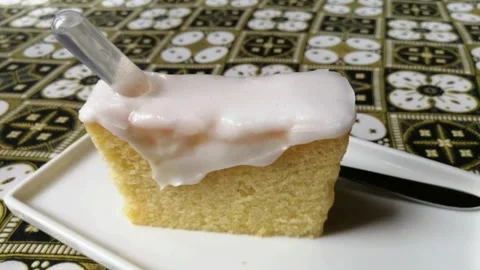 Slice of lemon pound cake with sugar Stock Footage 260538635