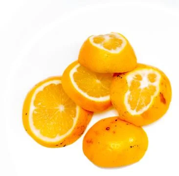 A slice of lemon on a white background Stock Photos