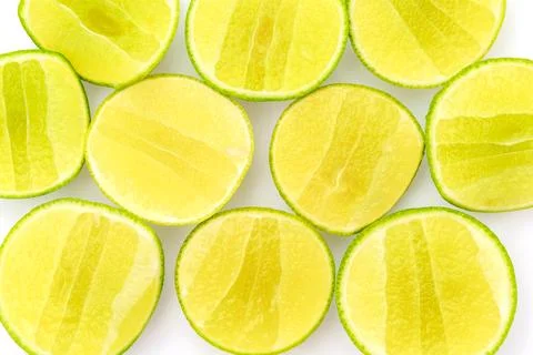 Slice of lemon on white background . Stock Photos