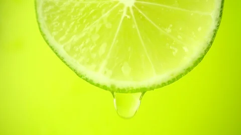 Slice of lime, a drop of water falls. Stock Footage 89188852