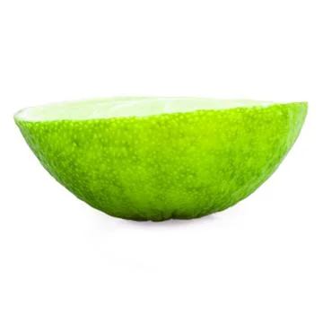 Slice of lime isolated on white Stock Photos