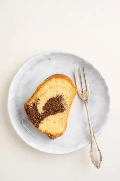 Slice of marble cake Stock Photos