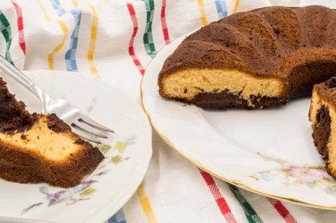 Slice of marbled cake on a plate Stock Photos