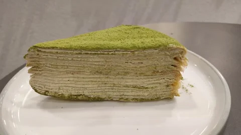 A slice of matcha mille crepe Stock Footage 262625846