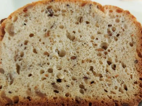 Slice of a multi-grain piece of bread Stock Photos