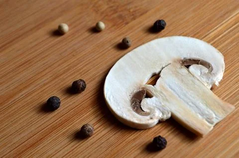 Slice of mushroom Stock Photos