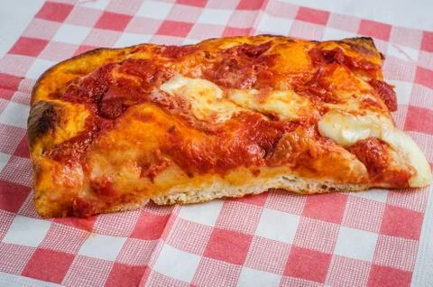 Slice of Neapolitan pizza Stock Photos