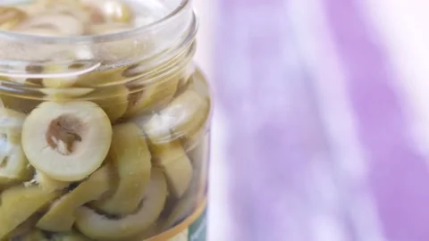 Slice of olive in a container Video stock 184999998