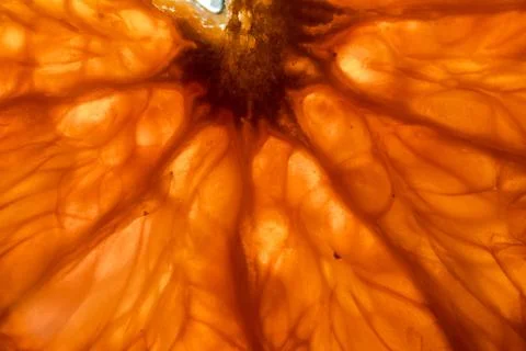 A slice of orange as background Stock Photos