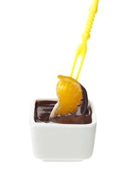 Slice of orange on a chocolate Stock Photos