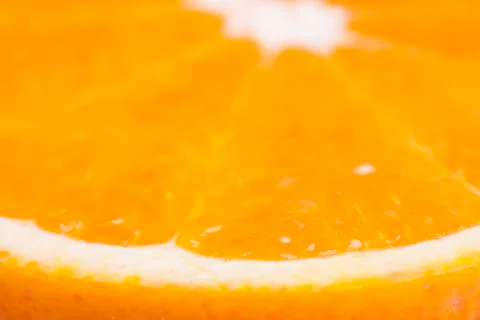 Slice of orange macro closeup Stock Photos