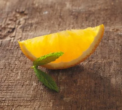 Slice of orange Stock Photos