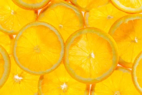 Slice of orange Stock Photos