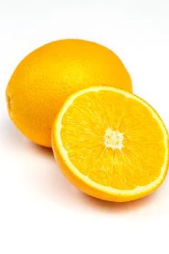 Slice of orange Stock Photos