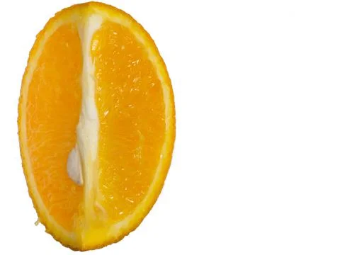 Slice of orange on a white background. fruit isolate. Juicy orange on the tab Stock Photos