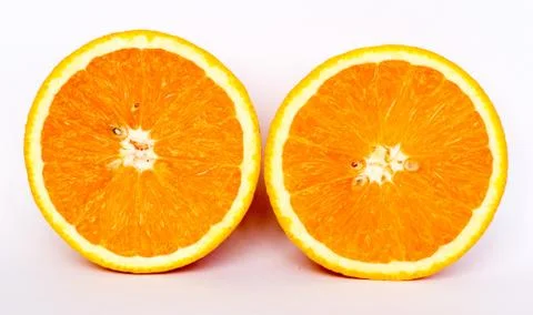 Slice of orange on white background Stock Photos