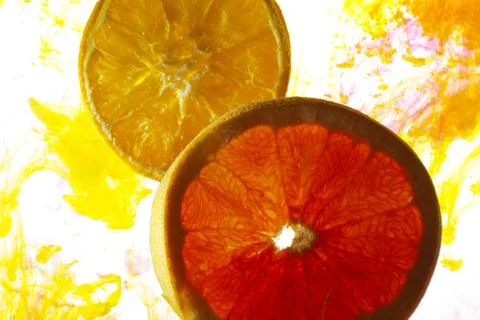 Slice oranges in water Stock Photos