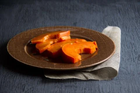 Slice of papaya fruit Stock Photos