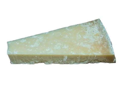 Slice of parmesan isolated on white Fotos Stock