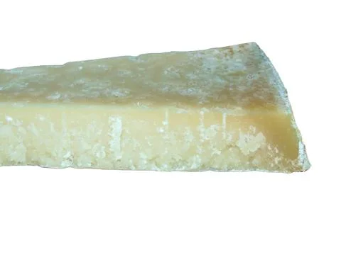 Slice of parmesan isolated on white Stock Photos